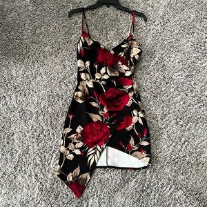 Asymmetrical mini dress with cinched waist and spaghetti straps